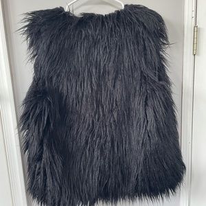 Black faux fur vest